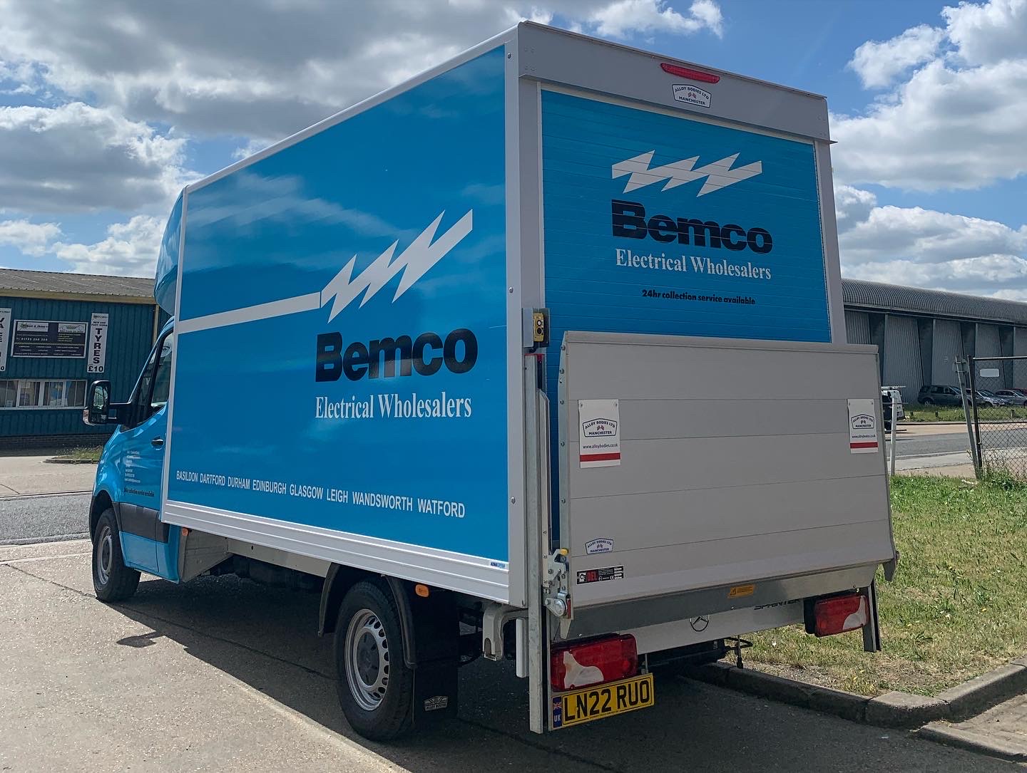 Luton box van with a full printed wrap and tail lift
