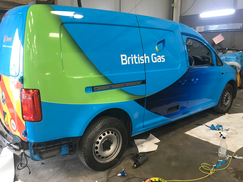 Van with replacement wrap after damage