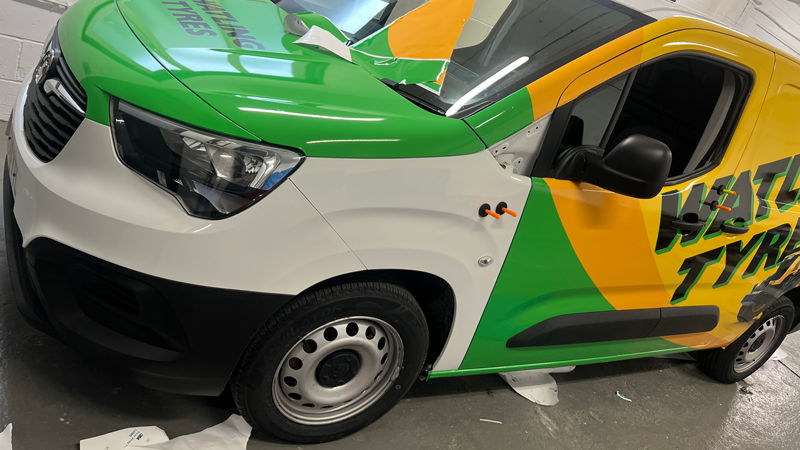 Fleet van with graphics replaced after accident repair